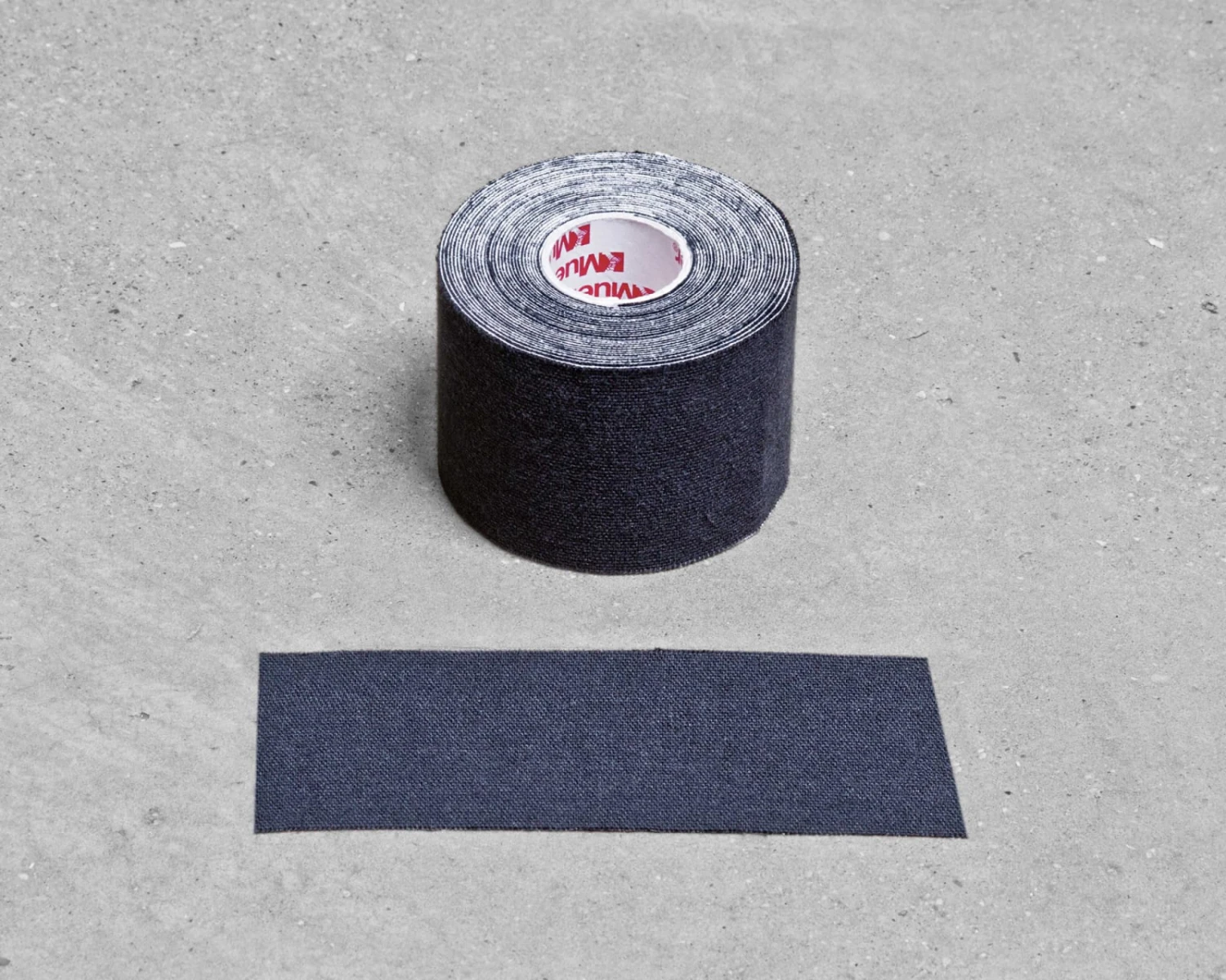 Mueller Kinesiology Tape 2" X 16.4' - Black 4 Mueller Kinesiology Tape 2" X 16.4' - Black - Image 2